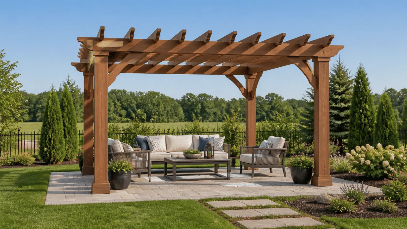 Freestanding wooden pergola with outdoor seating placed in an open backyard garden area